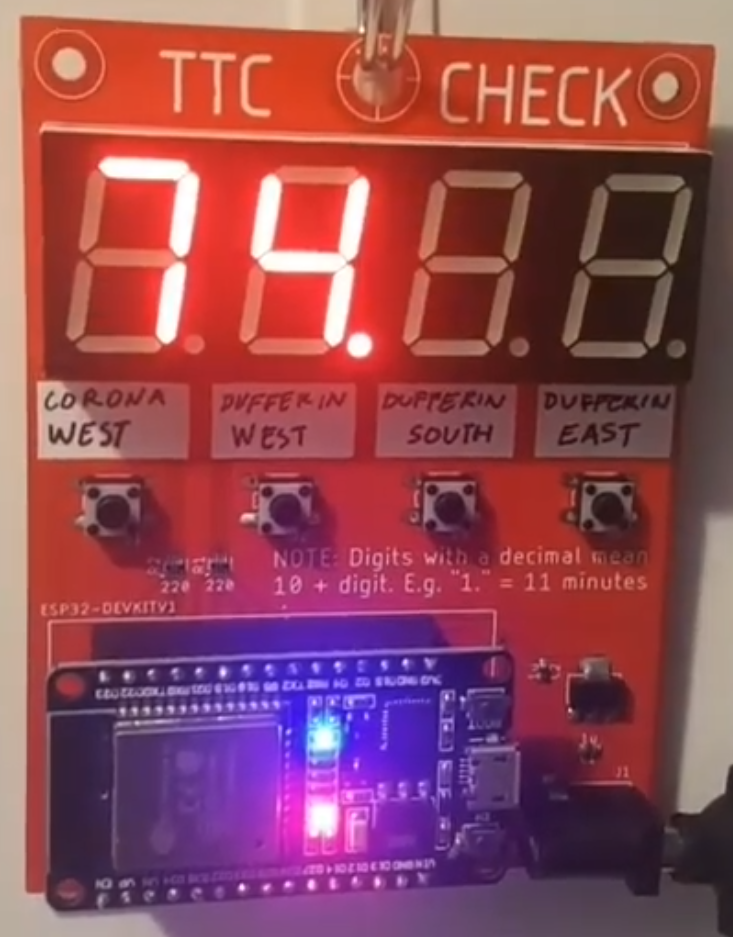 The board in operation (showing a bus will arrive in 7 and 14 minutes)