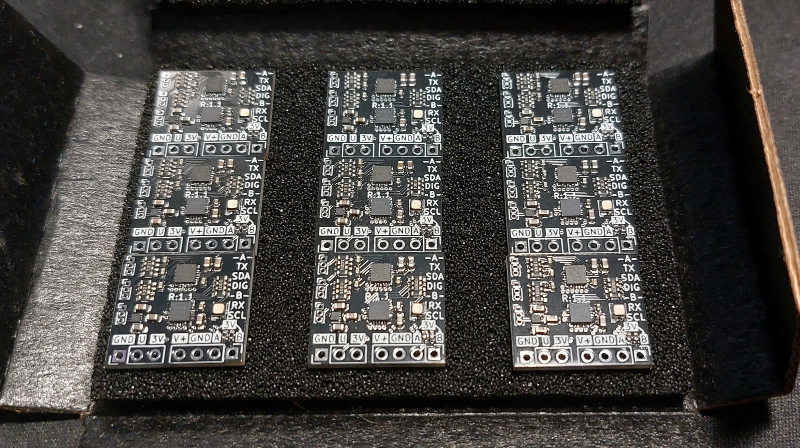 Array of assembled boards ready for final assembly.