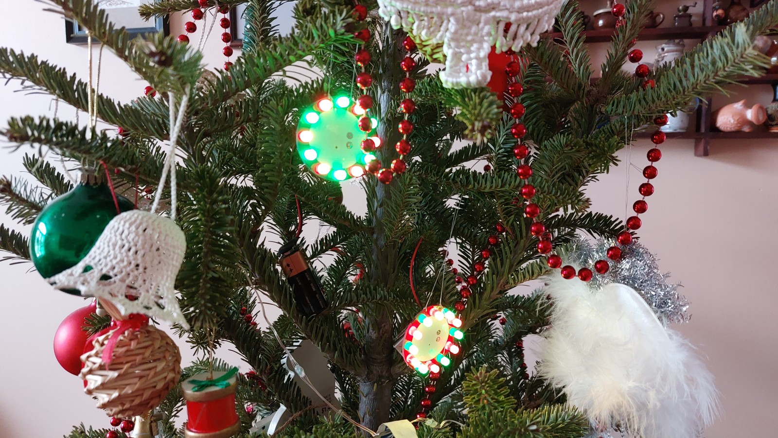 Ornaments in a tree, burning bright and killing 9V batteries.